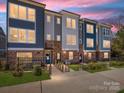 Stylish townhomes with colorful exteriors and manicured lawns, creating curb appeal at 3904 Craig Ave, Charlotte, NC 28211