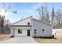 Charming single-Gathering home with modern architectural design, fresh landscaping, and a welcoming front entrance at 929 Junius St, Gastonia, NC 28052