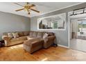 Comfortable living room with hardwood floors, gray walls and view to kitchen at 3204 Starrland Dr, Gastonia, NC 28052