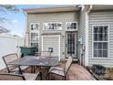 Outdoor patio area with table and seating, perfect for entertaining or relaxing at 157 Talbert Town Loop, Mooresville, NC 28117
