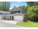 Beautiful two-story home with a two-car garage and manicured landscaping at 222 Ventner Ct, Charlotte, NC 28214
