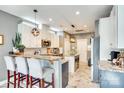 Stylish kitchen features granite countertops, stainless steel appliances, and a center island at 249 Sand Paver Way, Fort Mill, SC 29708