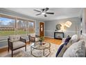 Bright living room featuring a large window, neutral decor and hardwood flooring at 512 Rhodes Ave, Kings Mountain, NC 28086