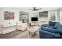 Inviting living room with modern furnishings and an open floor plan to the kitchen at 621 Bristol Dr, Statesville, NC 28677