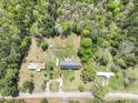 Bird's-eye view of the property, highlighting the spacious land, multiple structures, and mature trees at 1766 Duckwood Rd, Lancaster, SC 29720
