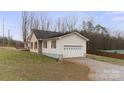 Single Gathering home with an attached garage, siding and brick accents at 201 Indian Hill Rd, Union Grove, NC 28689