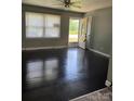 Inviting living room featuring hardwood floors, bright window, and a ceiling fan at 948 Shannon Bradley Rd, Gastonia, NC 28052