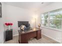 Bright office with desk, globe, and natural light, creating a productive workspace at 205 Falls Cove Dr, Troutman, NC 28166