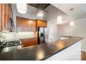 Well-appointed kitchen with modern appliances and ample counter space, ideal for preparing meals and entertaining at 3920 Sharon Rd # 208, Charlotte, NC 28211