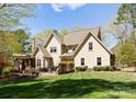 Spacious backyard with a patio perfect for outdoor dining at 13215 Claysparrow Rd, Charlotte, NC 28278