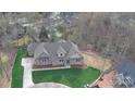 Expansive aerial shot showcasing a well-maintained home, lush yard, and serene neighborhood setting at 2069 Landry Ln # 233, Rock Hill, SC 29732