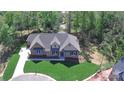 Charming home with brick accents, dormer window, well-kept lawn, and cul-de-sac street at 2069 Landry Ln # 233, Rock Hill, SC 29732