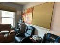Relaxing sitting area with natural light and comfortable chairs at 22 Heritage View Rd, Hickory, NC 28601