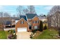 Beautiful brick home with black shutters, manicured lawn, and a two-car garage at 2622 Rolling Ridge Dr, Hickory, NC 28602