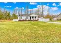 Beautiful home with a lush green lawn and an inviting exterior, perfect for Gathering living at 348 Fleetwood Rd, York, SC 29745