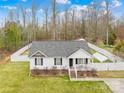 Charming single-Gathering home with a well-maintained lawn and inviting front porch at 348 Fleetwood Rd, York, SC 29745