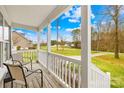 Inviting porch view featuring comfortable seating and a serene neighborhood backdrop at 348 Fleetwood Rd, York, SC 29745