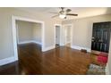 Spacious living room showcasing hardwood floors, freshly painted walls, and natural light at 104 N 9Th St, Bessemer City, NC 28016