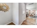 Bright entryway featuring wood floors, neutral walls, and an open view into the living area at 2310 Hedgecliff Rd # 159, Kannapolis, NC 28025