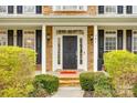 Elegant front entrance with stone columns and manicured shrubbery at 341 Fischer Rd, Fort Mill, SC 29715