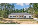Charming single-story home with a welcoming front porch and manicured lawn at 2194 Lannie Ln, Rock Hill, SC 29730