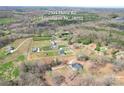 An aerial view of a home with expansive lawn space in a peaceful neighborhood at 2504 Hovis Rd, Lincolnton, NC 28092