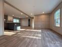 Spacious living room featuring hardwood floors, recessed lighting, and an open floor plan at 3094 Hollywood Dr, Gastonia, NC 28052