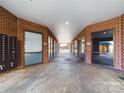 Exterior hallway featuring secure mailboxes and access to the units at 1410 4Th Street Nw Dr # 202, Hickory, NC 28601