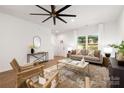 Bright and open living room showcases modern decor and a welcoming ambiance at 3117 Williams Rd, Matthews, NC 28105
