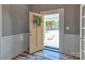 Welcoming entryway features a decorated front door opening to the home's exterior at 415 E Richland St, Kershaw, SC 29067