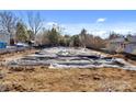 Foundation of a new home is underway, showing the concrete slab covered with protective material at 425 Messner St, Salisbury, NC 28144