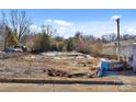 Active construction site showcases a new home's foundation ready for building in a suburban area at 425 Messner St, Salisbury, NC 28144