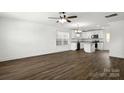 Bright, open-concept living space showcasing hardwood floors and natural light from large windows at 425 Messner St, Salisbury, NC 28144