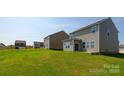 Large, green backyard, with ample space for outdoor activities at 327 Brinkley Dr # 107, Kings Mountain, NC 28086