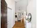 Spacious entryway flows into the living area with hardwood floors at 2405 Ivy Run Dr, Indian Trail, NC 28079