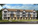 Charming new townhome with white and stone siding, black trim, and a manicured lawn at 3218 Stelfox St, Charlotte, NC 28262