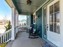 Cozy front porch featuring rocking chairs and a view of the neighborhood at 388 Luray Way, Rock Hill, SC 29730
