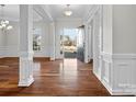 Bright foyer with hardwood floors, white trim, and an open view of the front yard at 4030 Ambleside Dr, Fort Mill, SC 29707