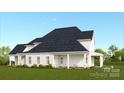 Stylish new construction home with covered porch, clean lines, professional landscaping, and a side entryway to attached garage at 7456 Fighting Creek Rd # 40, Sherrills Ford, NC 28673