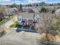 Features well-maintained townhomes in a community with parking areas, surrounded by mature trees at 8004 Sapwood Ct, Matthews, NC 28104