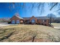 Beautiful brick home with a well-maintained lawn and an attached two-car garage at 102 3Rd Se Ave, Catawba, NC 28609