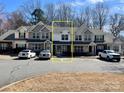 Attractive townhouse complex featuring a well-maintained facade and ample parking at 140 Marakery Rd # C, Mooresville, NC 28115
