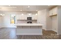 Spacious kitchen featuring an island, stainless appliances, and lots of cabinet space at 2058 Skyhawk Dr, Lake Wylie, SC 29745