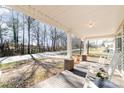 Relaxing front porch with rocking chairs and covered area at 308 W Charlotte Ave, Mount Holly, NC 28120
