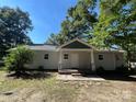 Inviting single-story home with a covered porch and a freshly painted exterior at 345 Mountain View St, Gastonia, NC 28052