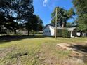 Expansive backyard with mature trees, perfect for outdoor activities and relaxation at 345 Mountain View St, Gastonia, NC 28052
