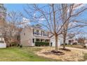 Inviting two-story home showcasing a well-maintained lawn and a cozy covered front porch at 733 Rocky Grove Gln, York, SC 29745