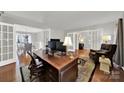 Bright office with french doors, hardwood floors, and modern furnishings at 1427 Matthews Plantation Dr, Matthews, NC 28105