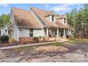 Well-maintained single Gathering home with a traditional design and a welcoming front porch at 1485 Sierra Rd, York, SC 29745