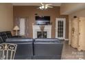 Cozy living room with fireplace, mantle, and abundant natural light at 2345 Nuthatch Dr, Rock Hill, SC 29732